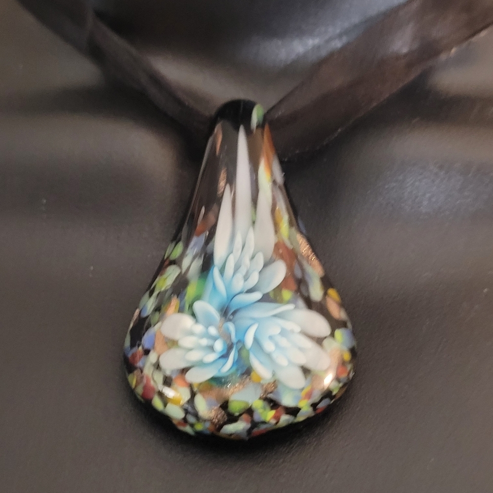 Black floral teardrop